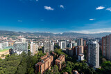Medellin, Antioquia, Colombia. May 3, 2023: Landscape with buildings and blue sky in the town.