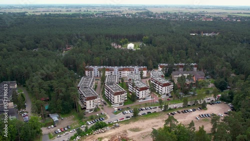 Wallpaper Mural Aerial View Of Apartment Buildings Surrounded By Green Trees In The Forest In Stegna, Poland. Torontodigital.ca