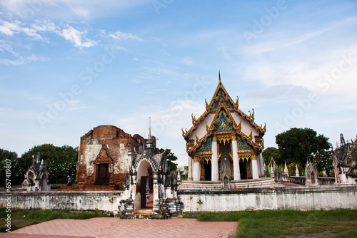 Ordination hall or antique old ubosot for thai travelers people travel visit respect praying blessing buddha wish myth at Wat Yai Chom Prasat temple in Tha Chin at Tha Chalom in Samut Sakhon, Thailand photo