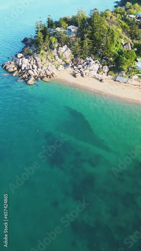 Panoramic view of Picnic Bay in Magnetic Island, beach and boat