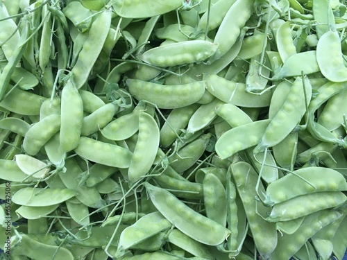 fresh green peas For sale at a street market in Chiang Mai Province, Northern Thailand. © Prachak
