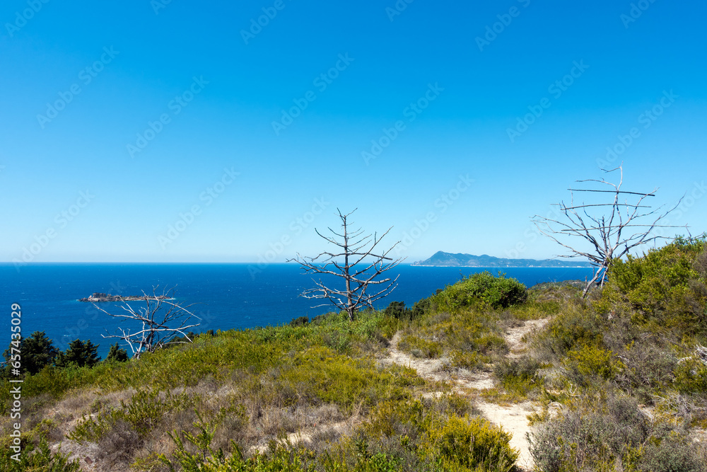 Stunning view down to the sea and the surrounding area from top of the mountain in Mathraki island, Greece