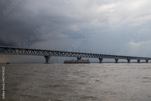 Most extensive Padma bridge photography under the dark cloudy sky © nhimage24