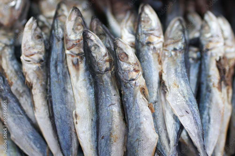 Heaps of salted sun dried fishes or ikan asin, a traditional comfort food in Indonesian Cuisine Heaps of salted sun dried fishes or ikan asin, a traditional comfort food in Indonesian Cuisine