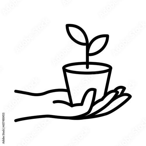 Hands are presenting a flower pot