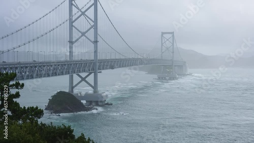 Typhoon hits Onaruto Bridge in Shikoku Japan photo