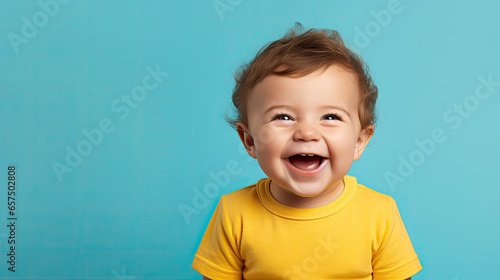 Happy baby on blue background