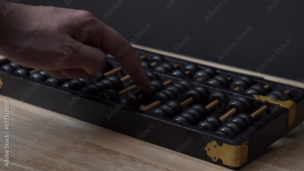 Using An Abacus To Make Calculations Using An Abacus To Make Calculations