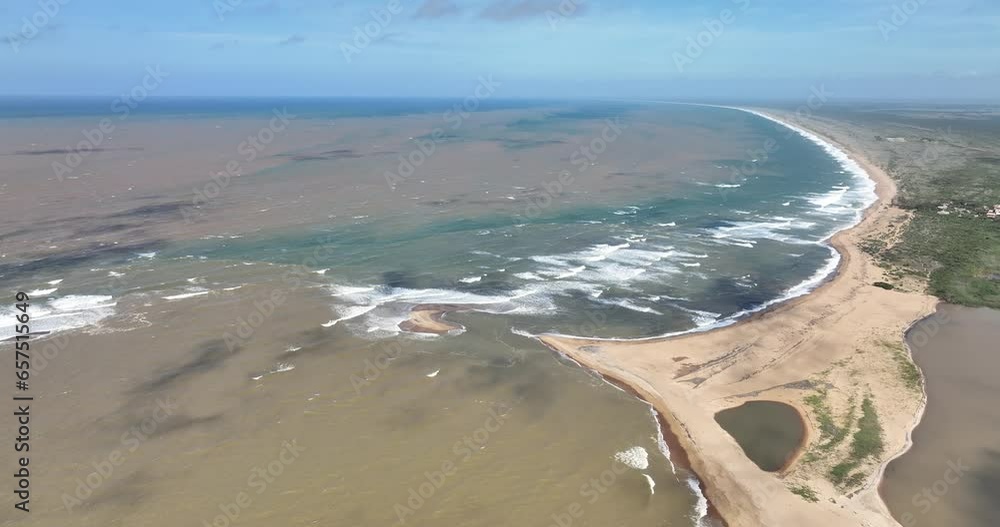 Aerial flying backwards from river mouth of Doce River and Atlantic Ocean, Brazil Aerial flying backwards from river mouth of Doce River and Atlantic Ocean, Brazil