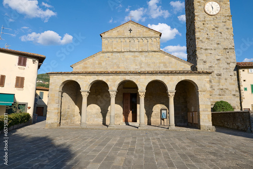 Beautiful medieval church with chapel in Italian city Reggello in the Region of Tuscany, sunny summer day. Copy ad space photo