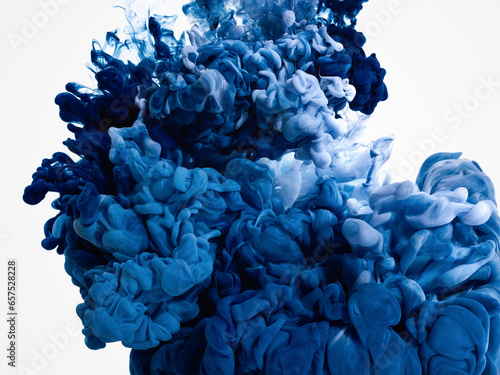 Splash of blue paint in water