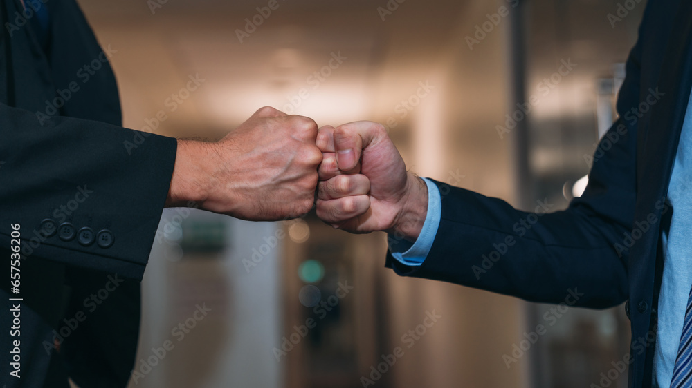 Fototapeta premium Business people handshake of partners at the office desk. Discussion among businesspeople on the latest developments.