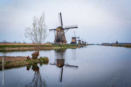 windmills at river in the country of holland © Denis Feldmann