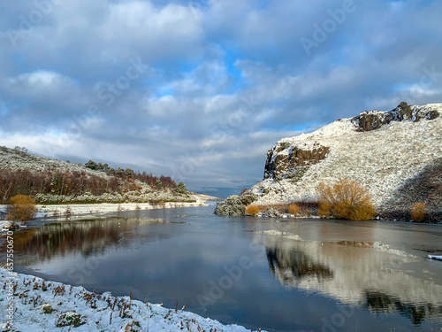 Dunsapie loch winter landscape with snow in Holyrood park, Arthur's Seat hill, Edinburgh, Scotland UK photo