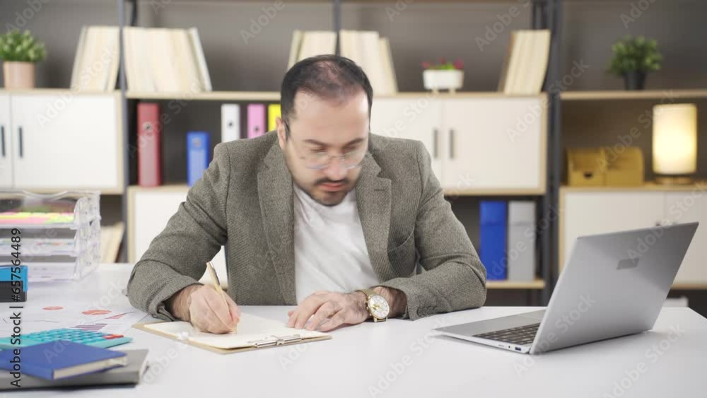 Stressed and worried Businessman working in office. Stressed and worried Businessman working in office.