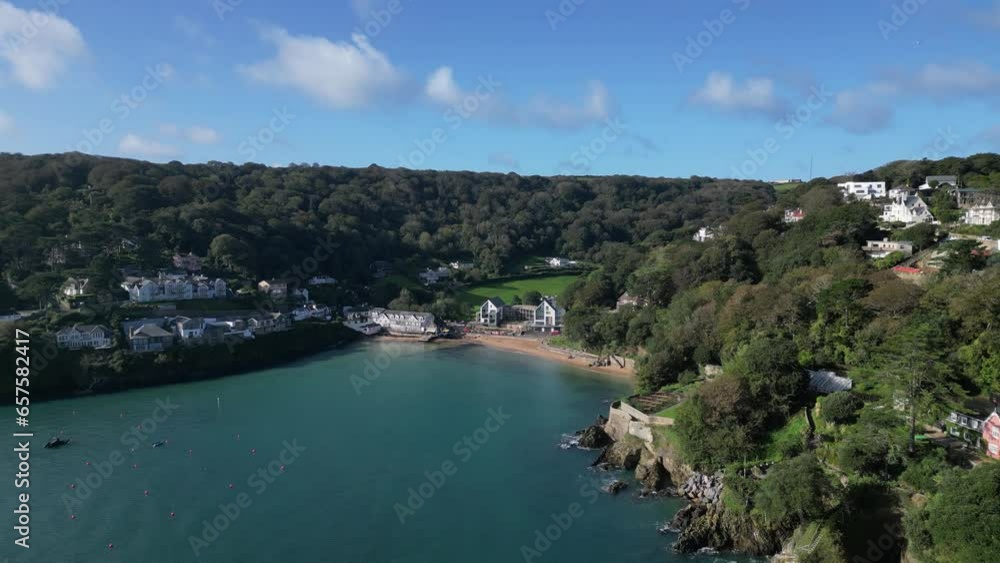 Salcombe Harbour, South Devon, England: DROVE VIEWS: South Sands beach and Waterfront properties. Salcombe is a popular UK holiday resort with some of the most expensive properties in the country. Salcombe Harbour, South Devon, England: DROVE VIEWS: South Sands beach and Waterfront properties. Salcombe is a popular UK holiday resort with some of the most expensive properties in the country.