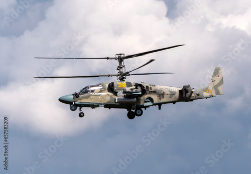 ZHUKOVSKY, RUSSIA - 25 July 2021: Demonstration of the Kamov Ka-52 Alligator attack helicopter of the Russian Air Force at MAKS-2021, Russia