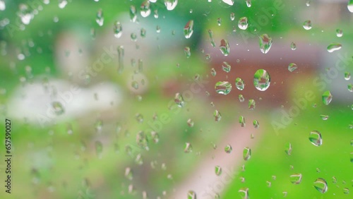 Wallpaper Mural Blurred window background on a rainy autumn day. Water drops on glass close up Torontodigital.ca