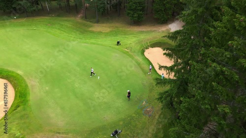 golf course, golf competition, golfers playing golf, drone footage