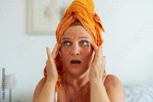 Middle aged woman with smudged mascara