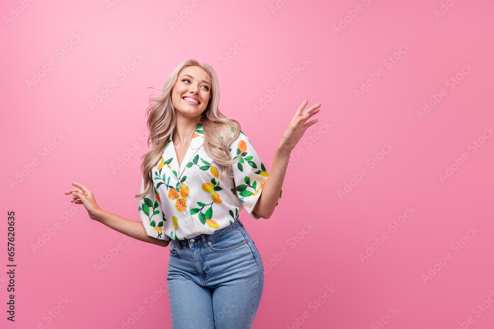 Photo of attractive young girlfriend blonde wavy hair dancing choose new spring outfit looking novelty isolated on pink color background Photo of attractive young girlfriend blonde wavy hair dancing choose new spring outfit looking novelty isolated on pink color background