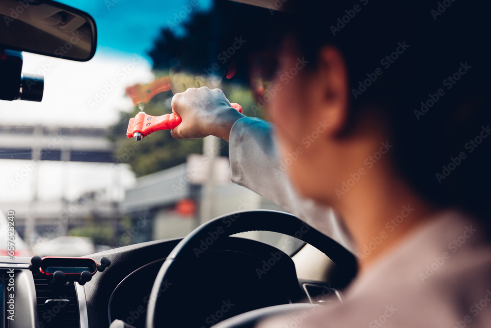 Woman use Safety Hammer and Seatbelt Cutter in Cars, break glass When