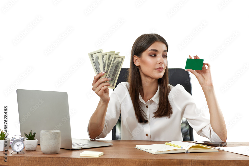 attractive lady holding cash and plastic card at the table attractive lady holding cash and plastic card at the table