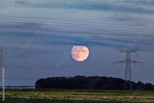 Obraz na plátně Super moon at the end of september 2023, full harvest moon, larger and brighter,