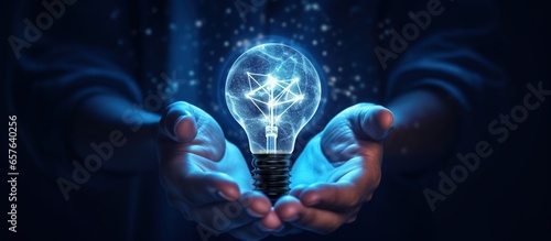 Digital marketing. Hands under light bulb, innovation technology,technology and network dark blue and blue background