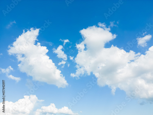 Blue sky and white clouds floated in the sky on a clear day with warm sunshine combined with cool breeze blowing against the body resulting in a miraculous refreshing like paradise.