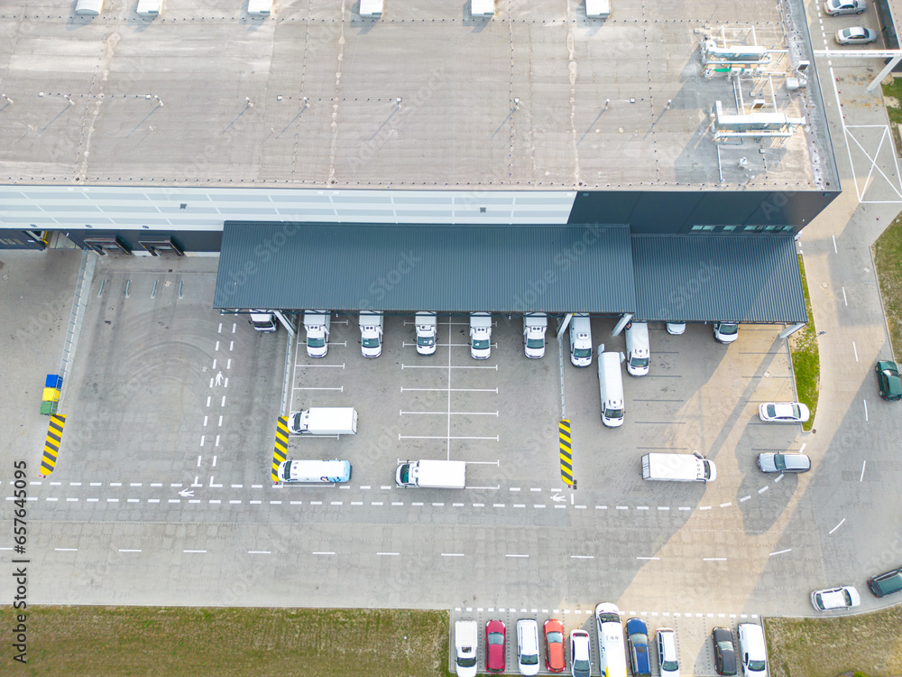 Warehouse storages or industrial factory or logistics center from above. Aerial view of industrial buildings and equipment machines. Aerial view Warehouse storages or industrial factory or logistics center from above. Aerial view of industrial buildings and equipment machines. Aerial view