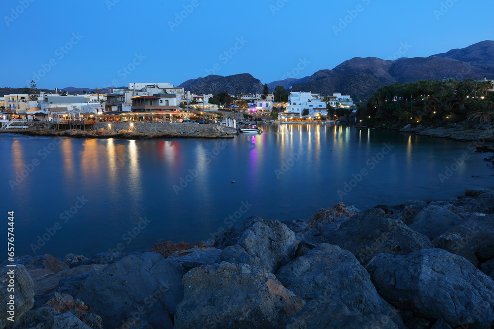 Twilight at the small fishing resort of Sissi, Crete, Greece.