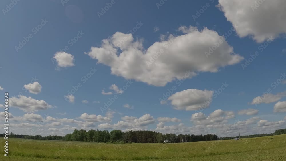 The fluffy clouds in the sky on a timelapse video on a fine morning in Estonia The fluffy clouds in the sky on a timelapse video on a fine morning in Estonia