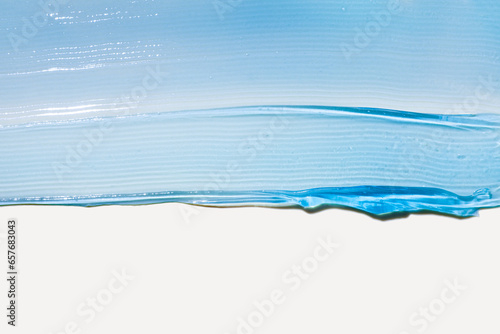 Cream gel gray blue transparent cosmetic sample texture with bubbles isolated on white background photo