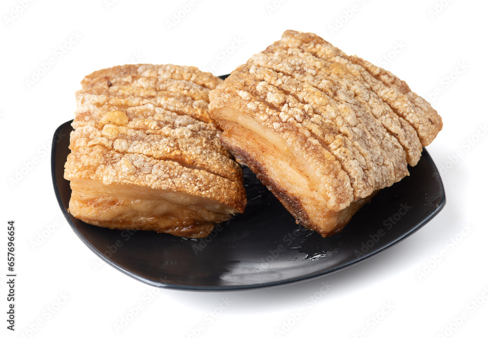 Fototapeta premium crispy pork belly or deep fried pork isolated on white background