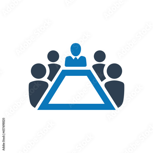Board room members sitting around a table icon