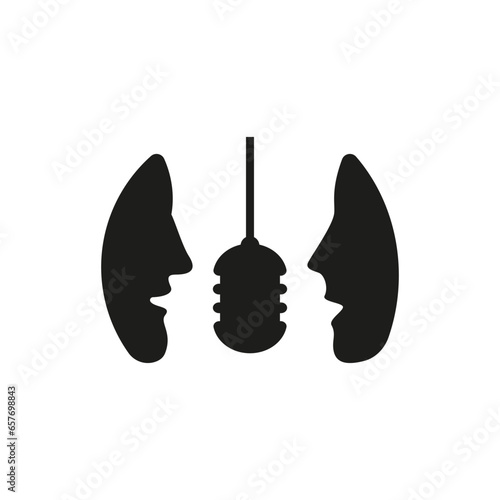 Two people talking into a microphone.