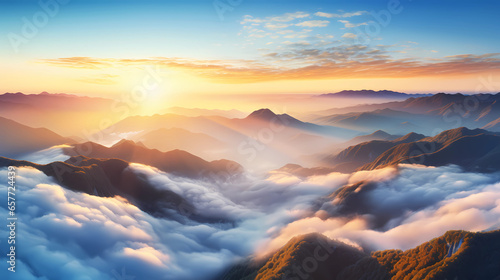 Golden sunrise above the clouds and mountain