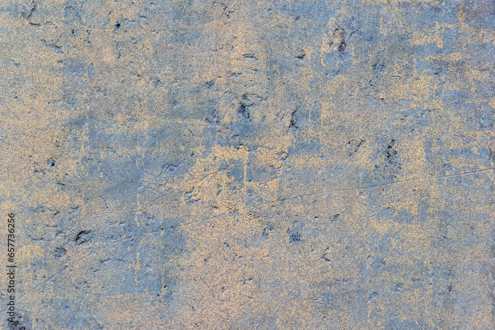 An area of the old surface with a wiped light blue paint An area of the old surface with a wiped light blue paint