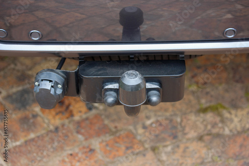 Close up of a large SUV tow hitch with plug