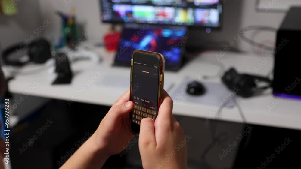 Boy using his smartphone and texting Boy using his smartphone and texting