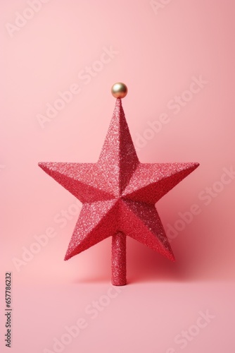 Red Christmas star tree on a pink background