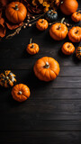 pumpkin over black wooden table background. Backdrop with copy space 