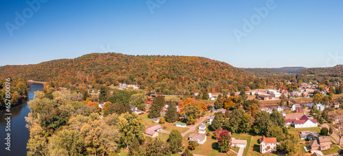 Aerial panorama of the small town of Confluence in Somerset County in Pennsylvania with fall colors on the leaves and trees