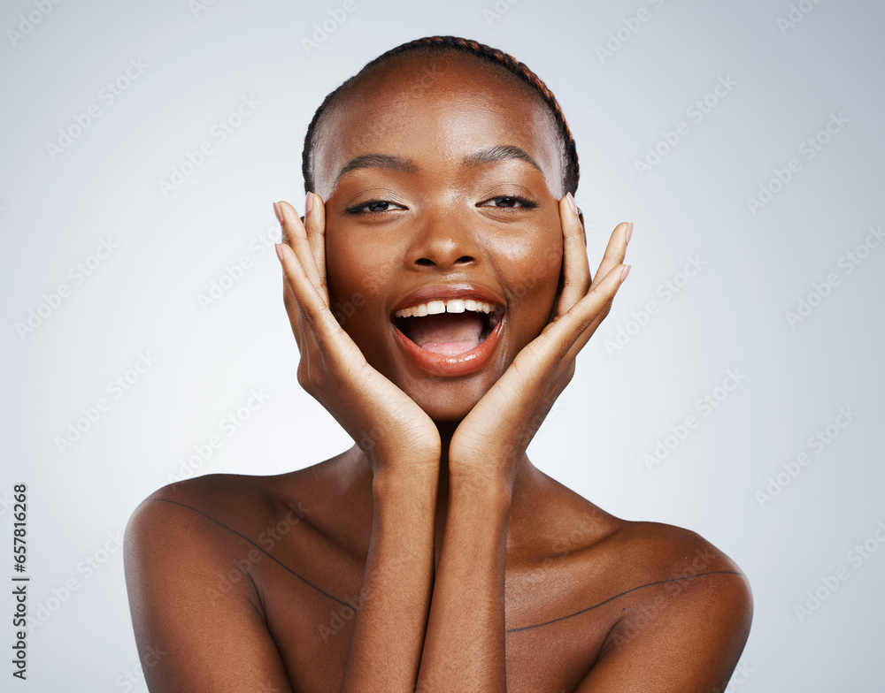 Portrait, skincare and hands on the cheek of a black woman in studio on a gray background for beauty or natural wellness. Face, spa or luxury and a young model with cosmetic or antiaging treatment Portrait, skincare and hands on the cheek of a black woman in studio on a gray background for beauty or natural wellness. Face, spa or luxury and a young model with cosmetic or antiaging treatment