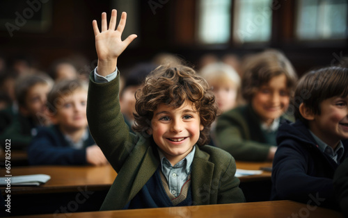 A schoolboy is raising his hand in a school classroom. Generative AI © piai