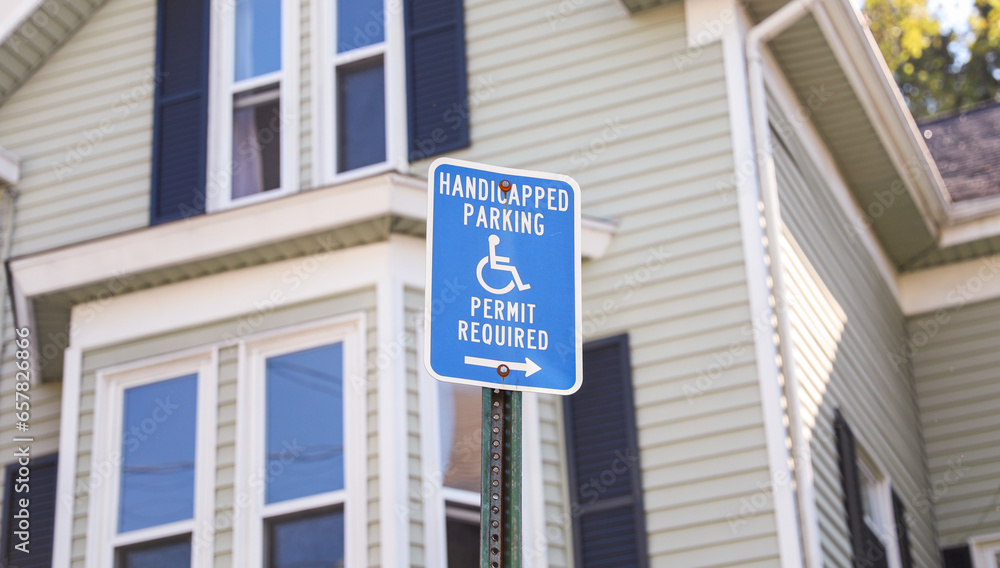 handicap wheelchair-accessible sign against a blurred background ...