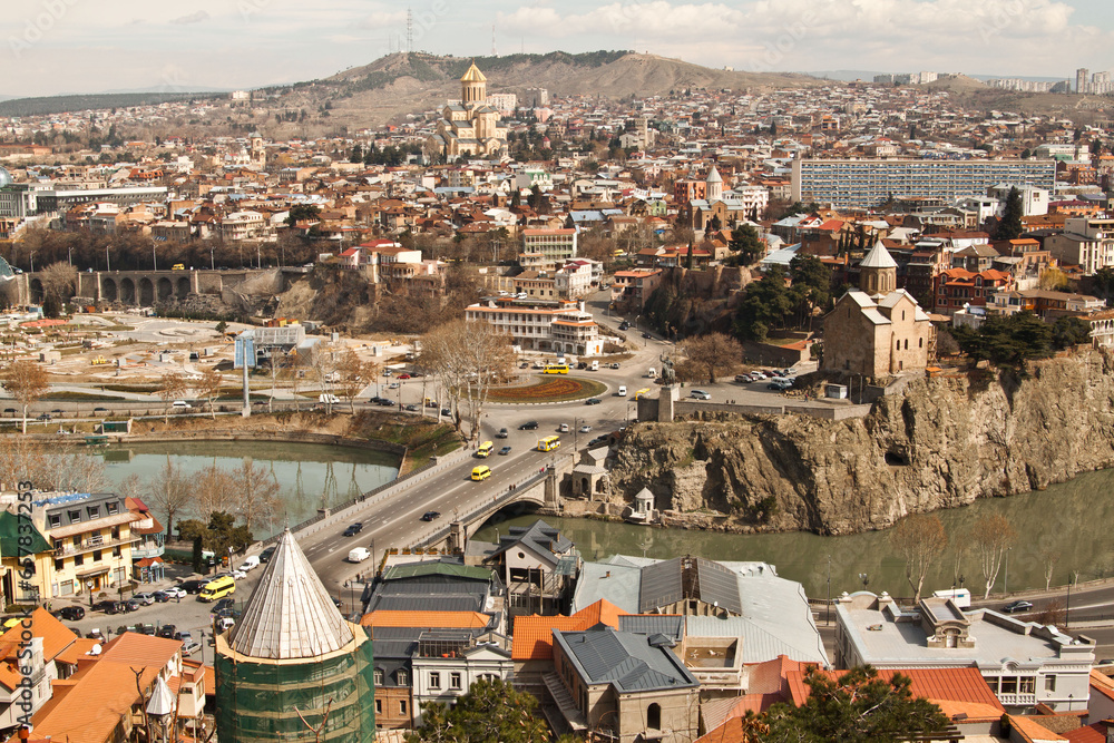 Aerial view of Old Tbilisi and cable car from Narikala Fortes. Sunny day in Tbilisi, Georgia