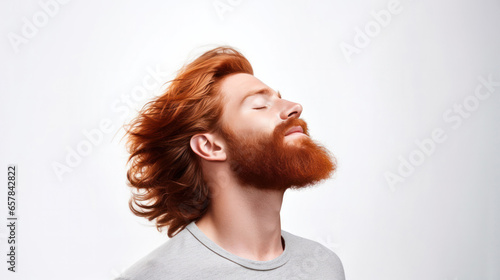 Pinnacle of Masculine Beauty: Studio Image of a Muscular Redhead Model with Beard