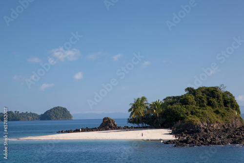 White sands of Granito de Oro Island edge into the Pacific, Coiba National Park; Panama photo